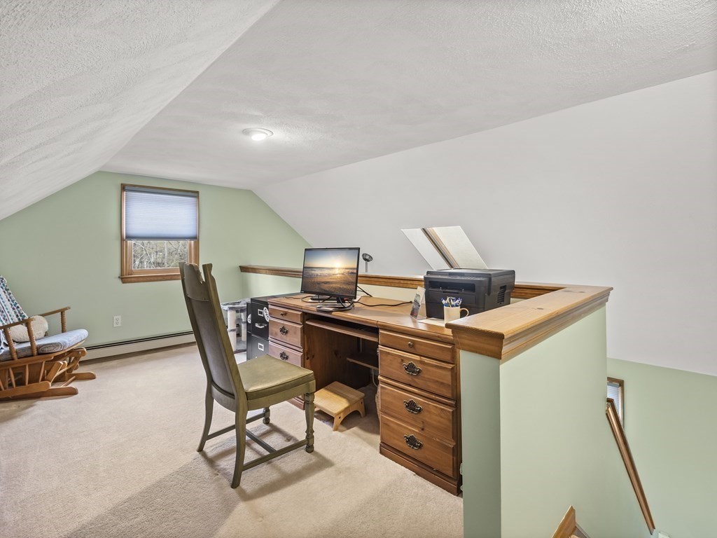 17 Chestnut Road Tyngsboro, MA 01879 - Photo 20 of 41 a workspace with furniture and white walls