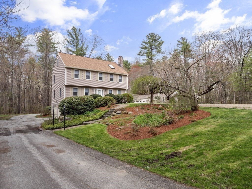 17 Chestnut Road Tyngsboro, MA 01879 - Photo 36 of 41 a view of a house with a yard