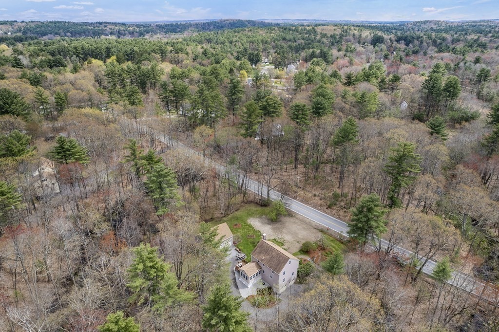 17 Chestnut Road Tyngsboro, MA 01879 - Photo 38 of 41 an aerial view of a house with a yard