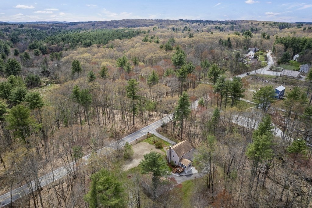 17 Chestnut Road Tyngsboro, MA 01879 - Photo 39 of 41 an aerial view of a house with a yard