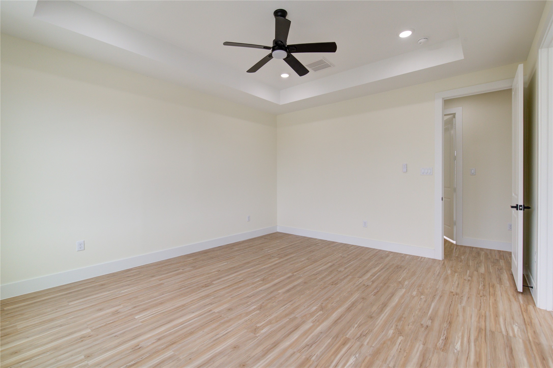 4308 Alice Street Houston, TX 77021 - Photo 24 of 25 a view of room with wooden floor and ceiling fan