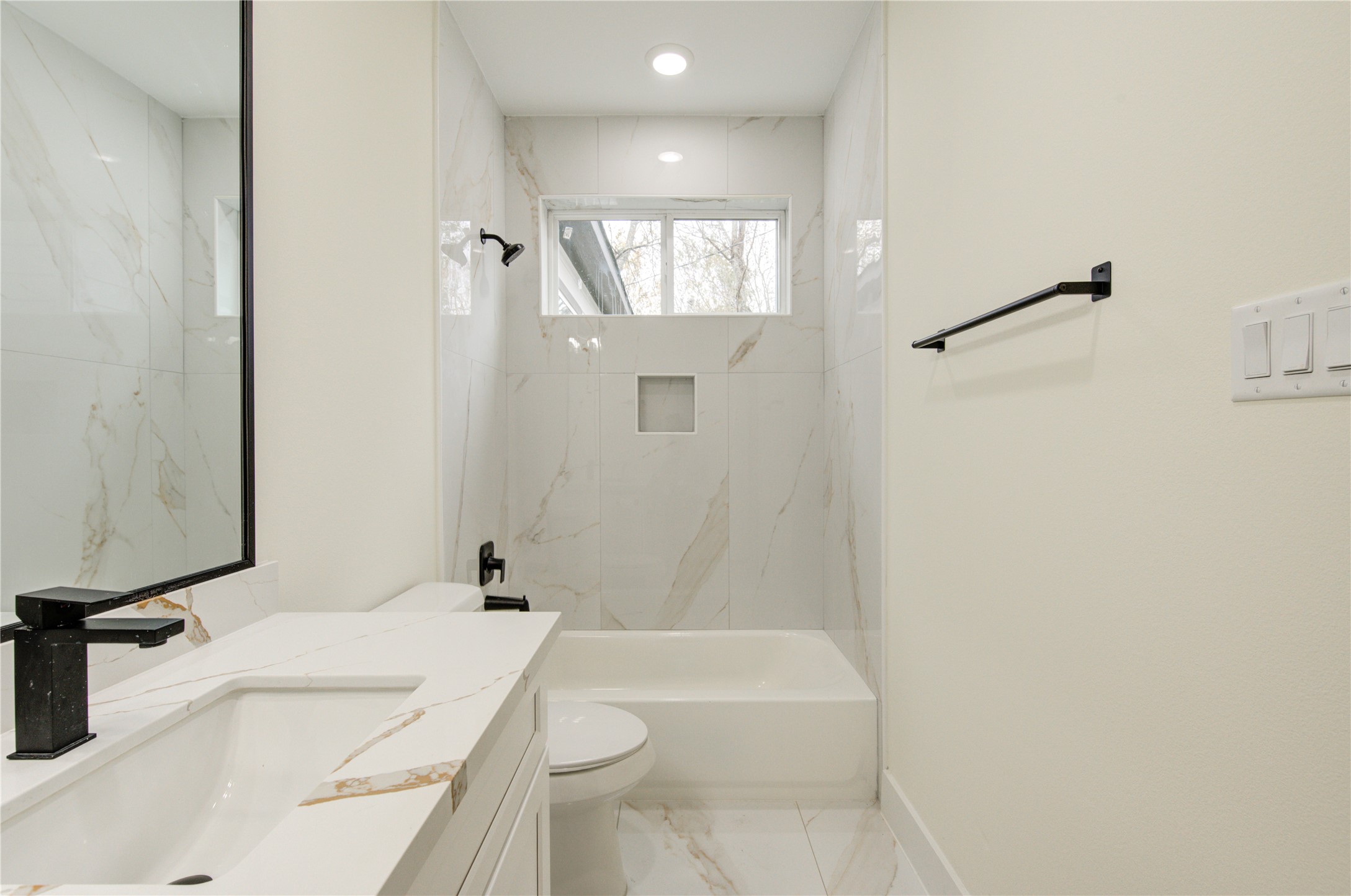 4308 Alice Street Houston, TX 77021 - Photo 6 of 25 a bathroom with a sink a toilet and shower