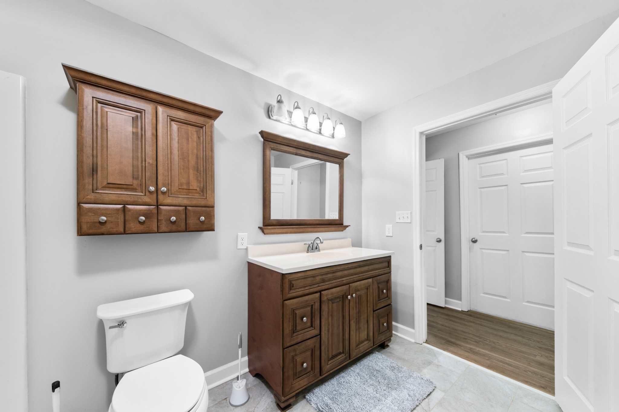3247 Woolard Road Santa Fe, TN 38482 - Photo 11 of 20 a bathroom with a toilet a sink and mirror
