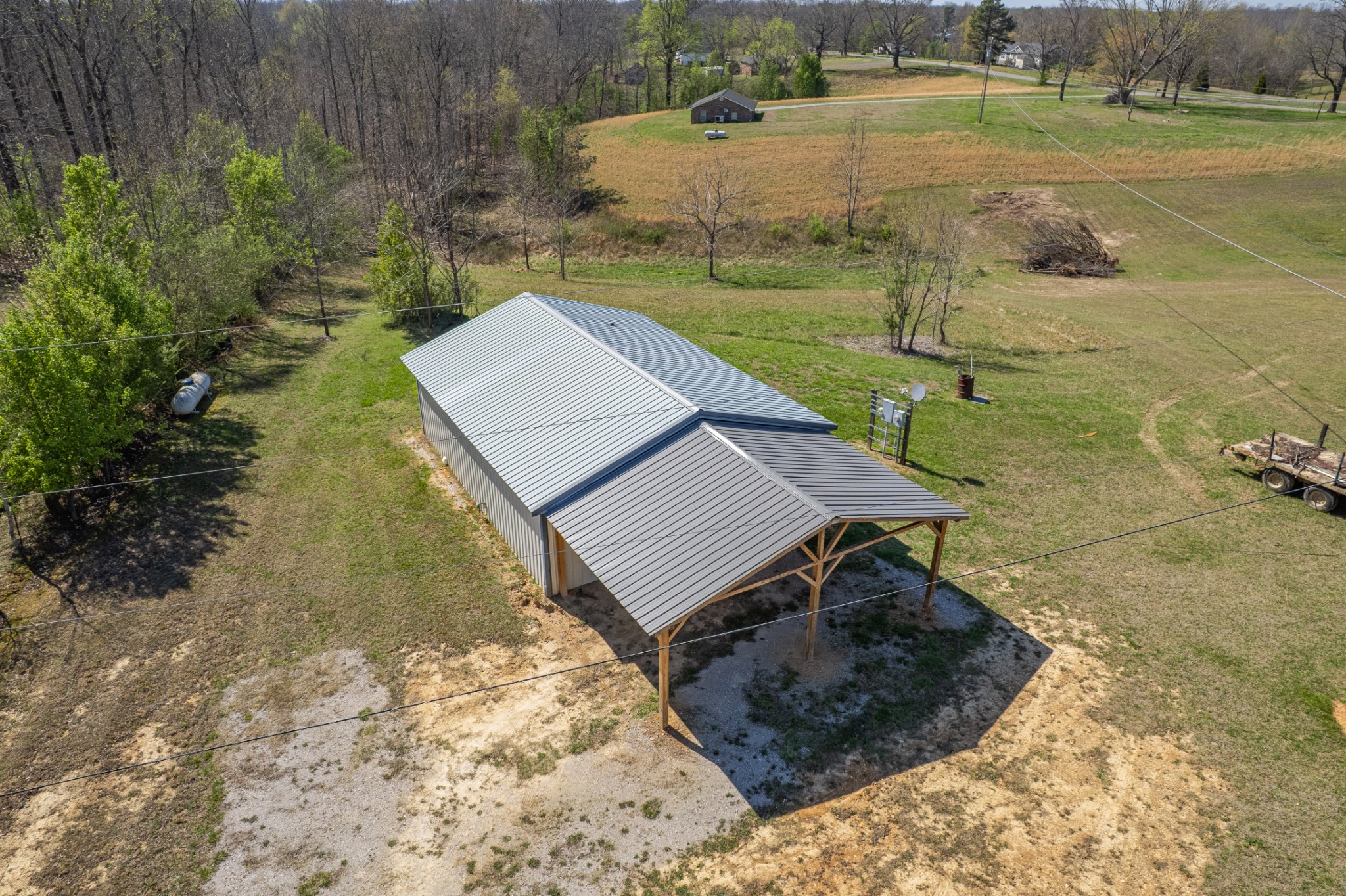 3247 Woolard Road Santa Fe, TN 38482 - Photo 15 of 20 a view of a backyard with lawn chairs and couches