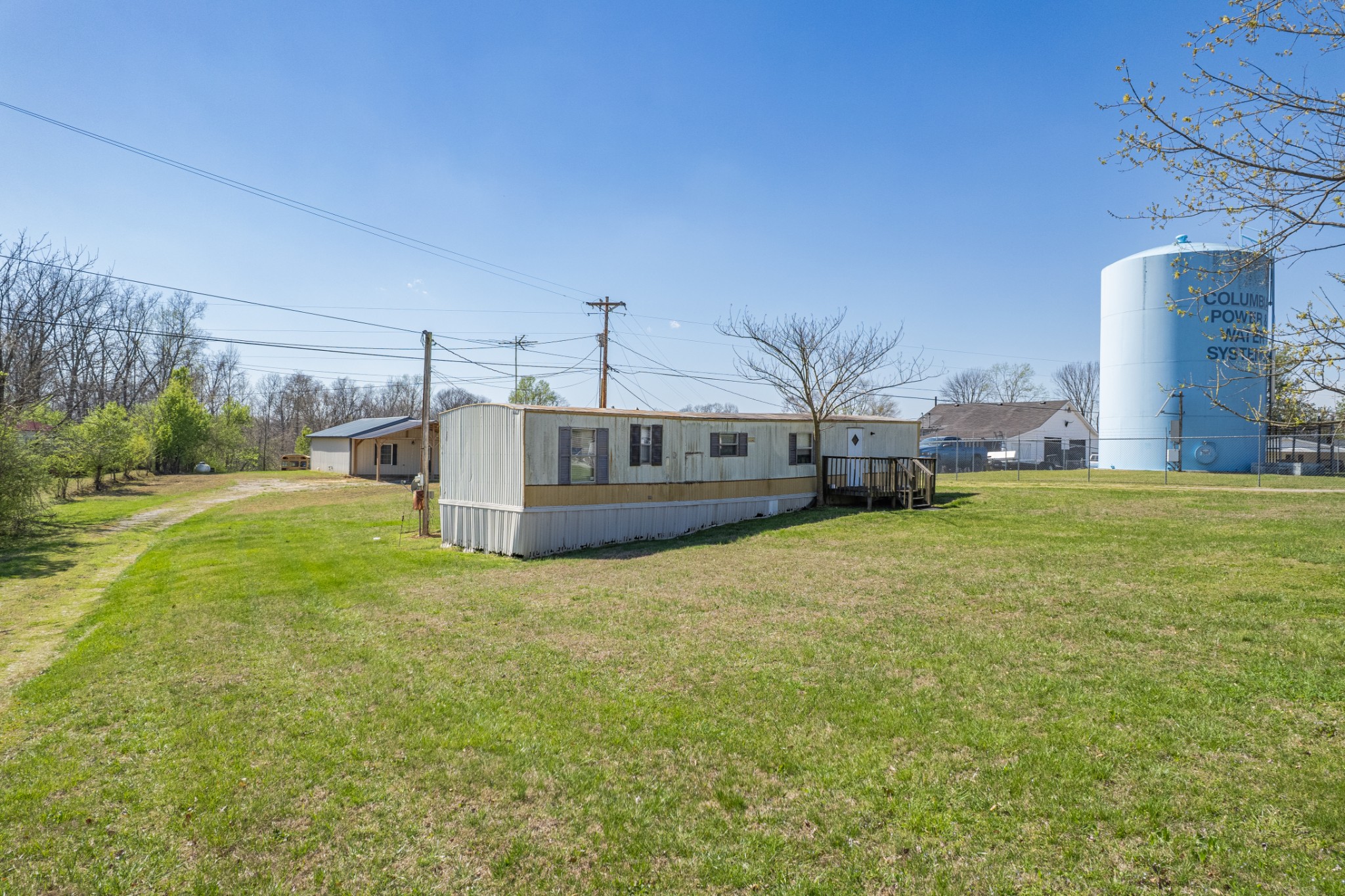 3247 Woolard Road Santa Fe, TN 38482 - Photo 20 of 20 a view of a house with a big yard