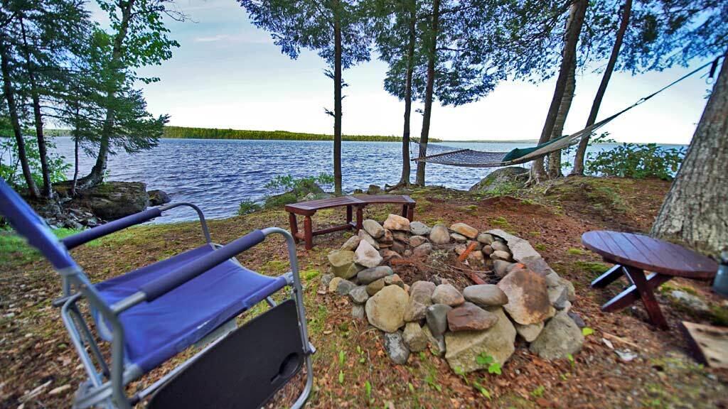 803 Chadwick Pt Road Weston, ME 04424 - Photo 88 of 116 lake-firepit-hammock-maine