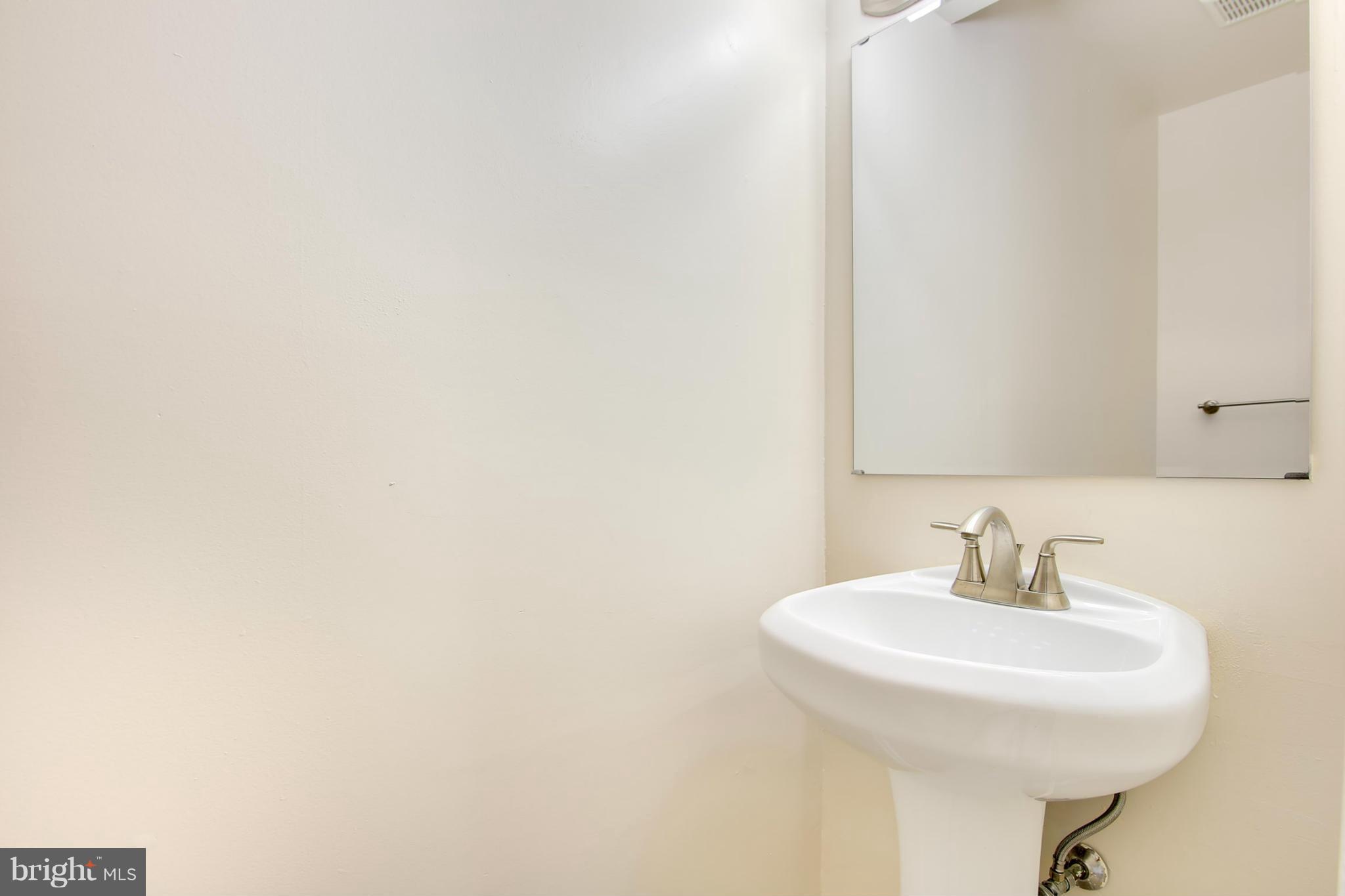 3108 Apple Road Northeast, Unit 12 Washington, DC 20018 - Photo 12 of 24 Main Level Half Bath
