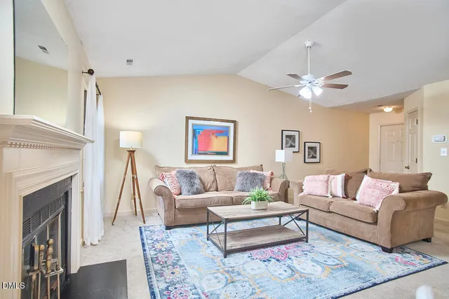 a kitchen with stainless steel appliances a sink a stove and a refrigerator