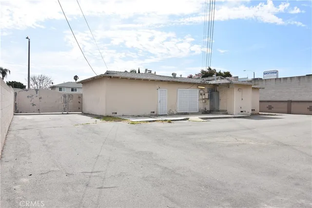 a view of a house with a street