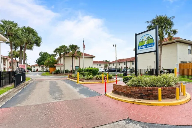 a view of an chairs and tables in the patio