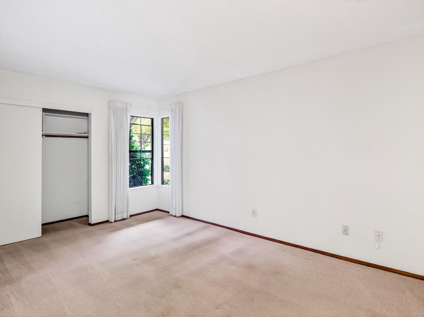 7391 Vía Cantares San Jose, CA 95135 - Photo 33 of 45 an empty room with windows