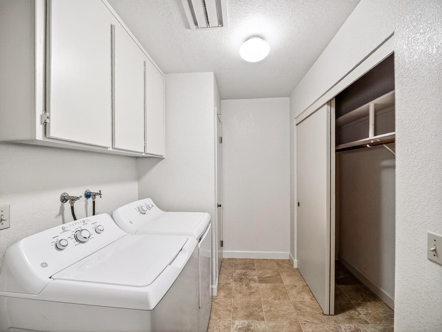 7391 Vía Cantares San Jose, CA 95135 - Photo 36 of 45 a utility room with dryer and washer