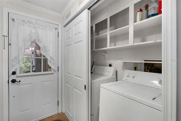 a kitchen with appliances cabinets and a sink