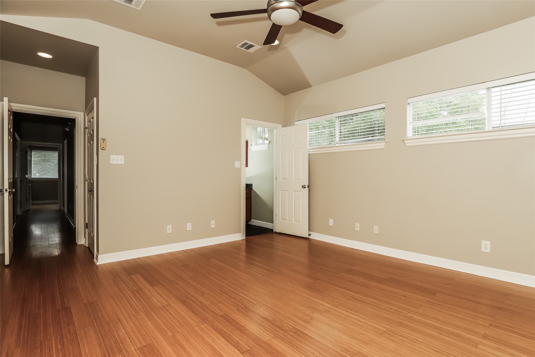 1701 Sanchez Street, Unit A Austin, TX 78702 - Photo 11 of 19 Hardwood flooring extends throughout this accommodating room, offering comfort and style.