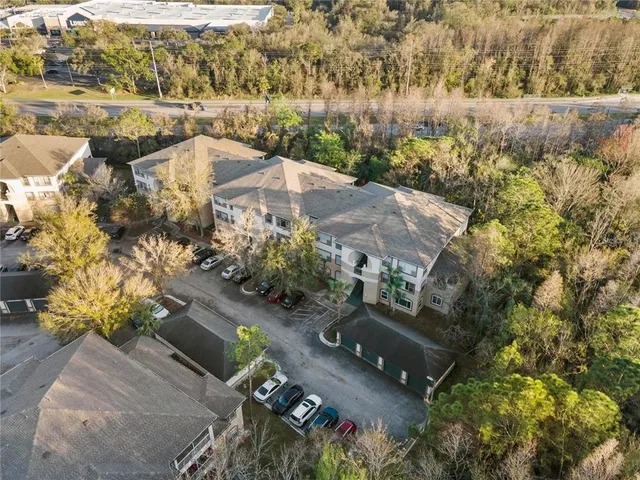an aerial view of residential house with outdoor space
