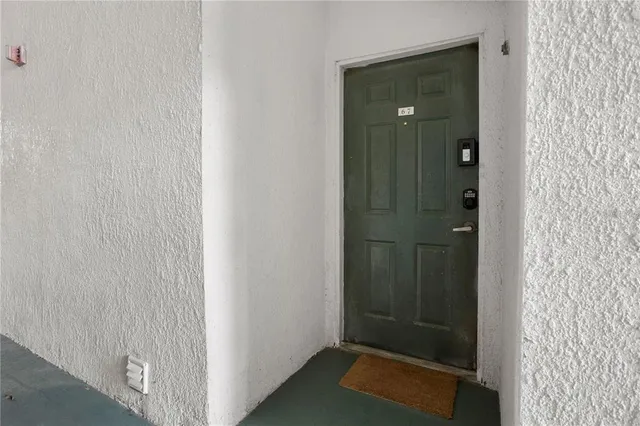 a view of elevator with hallway