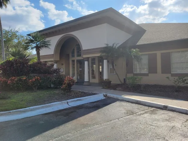 a lobby with furniture and window