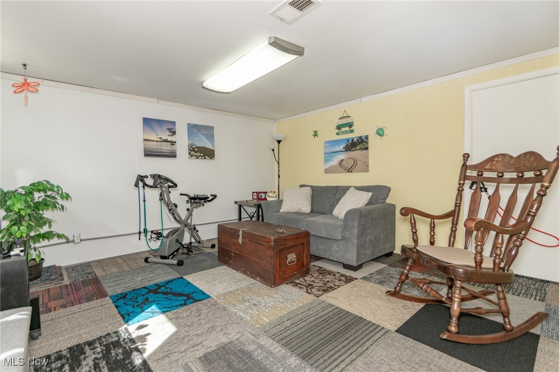 10495 Mulberry Road Chardon, OH 44024 - Photo 24 of 48 Den area featuring fresh paint and carpet