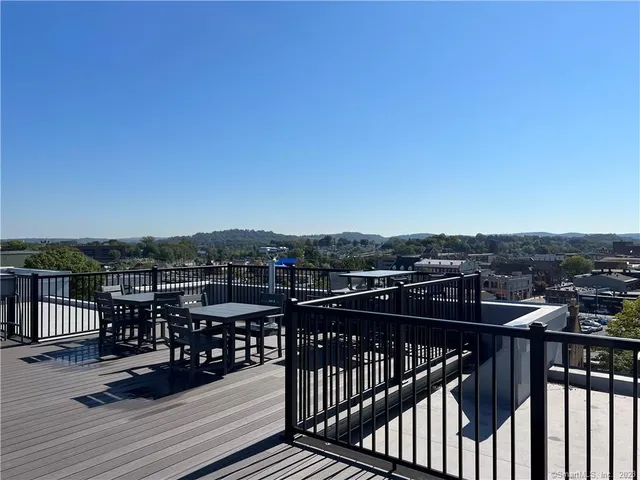 a view of a balcony with city view
