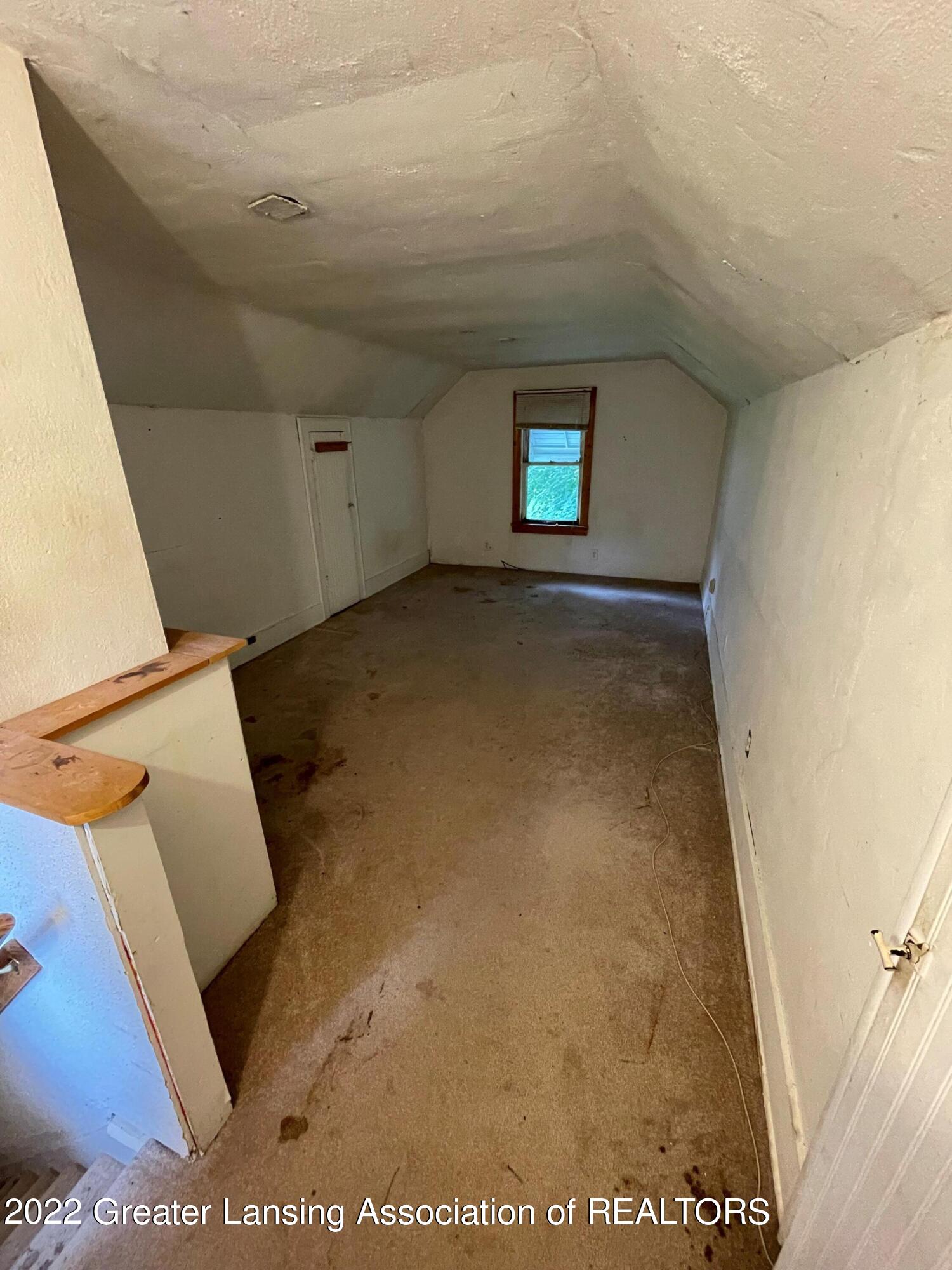 2318 West Jolly Road Lansing, MI 48911 - Photo 14 of 15 Up Stairs