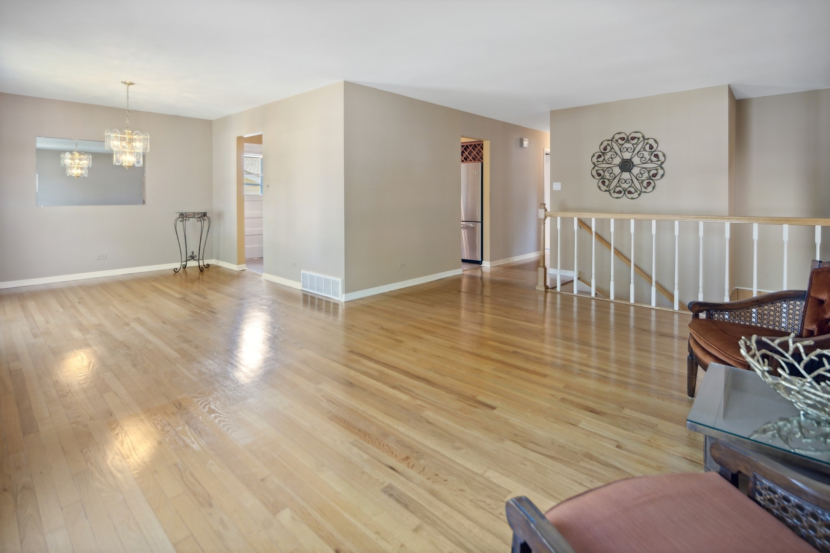 1025 Timber Lane Darien, IL 60561 - Photo 3 of 17 a view of a hallway with wooden floor