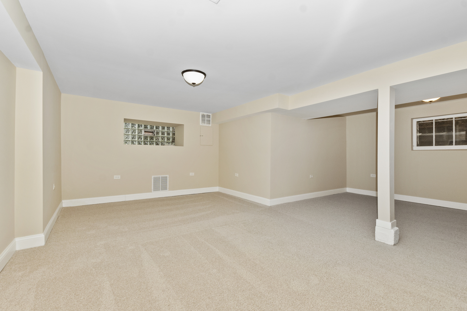 8317 South Merrill Avenue Chicago, IL 60617 - Photo 18 of 23 an empty room with windows