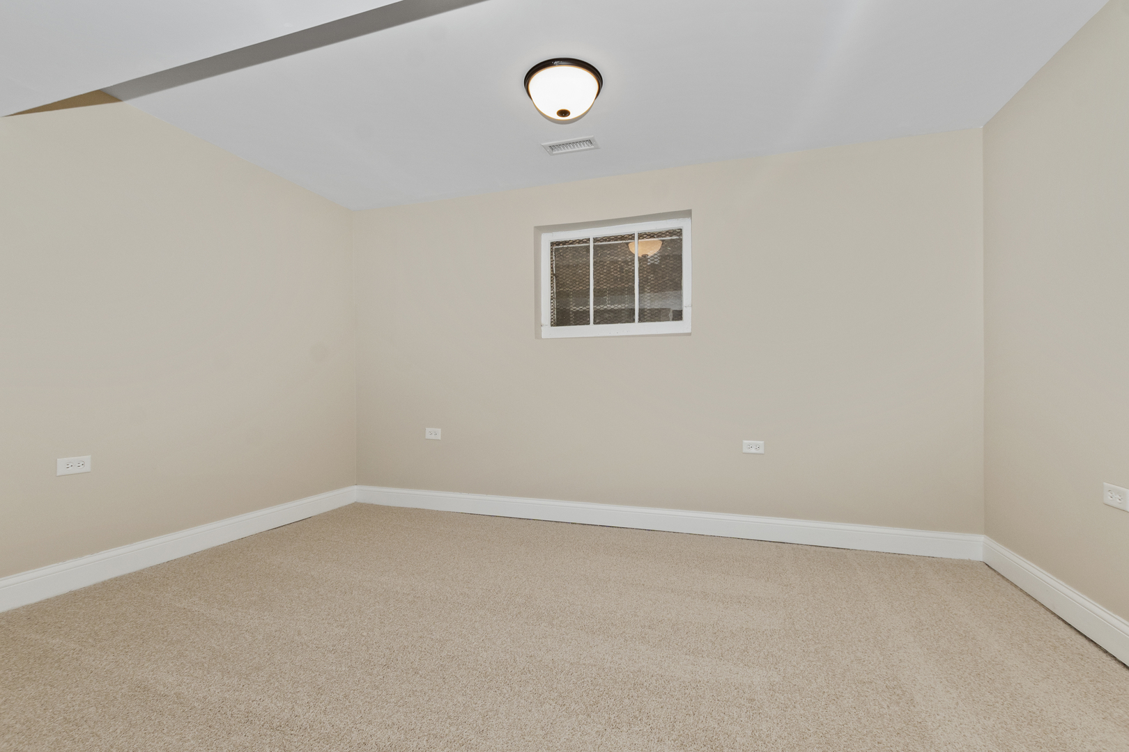 8317 South Merrill Avenue Chicago, IL 60617 - Photo 19 of 23 a view of an empty room with a window