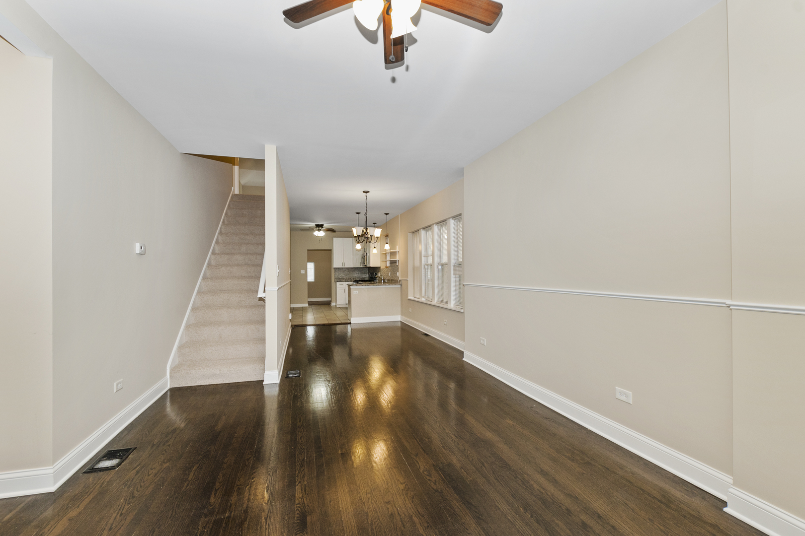 8317 South Merrill Avenue Chicago, IL 60617 - Photo 5 of 23 a view of entryway and hall with wooden floor