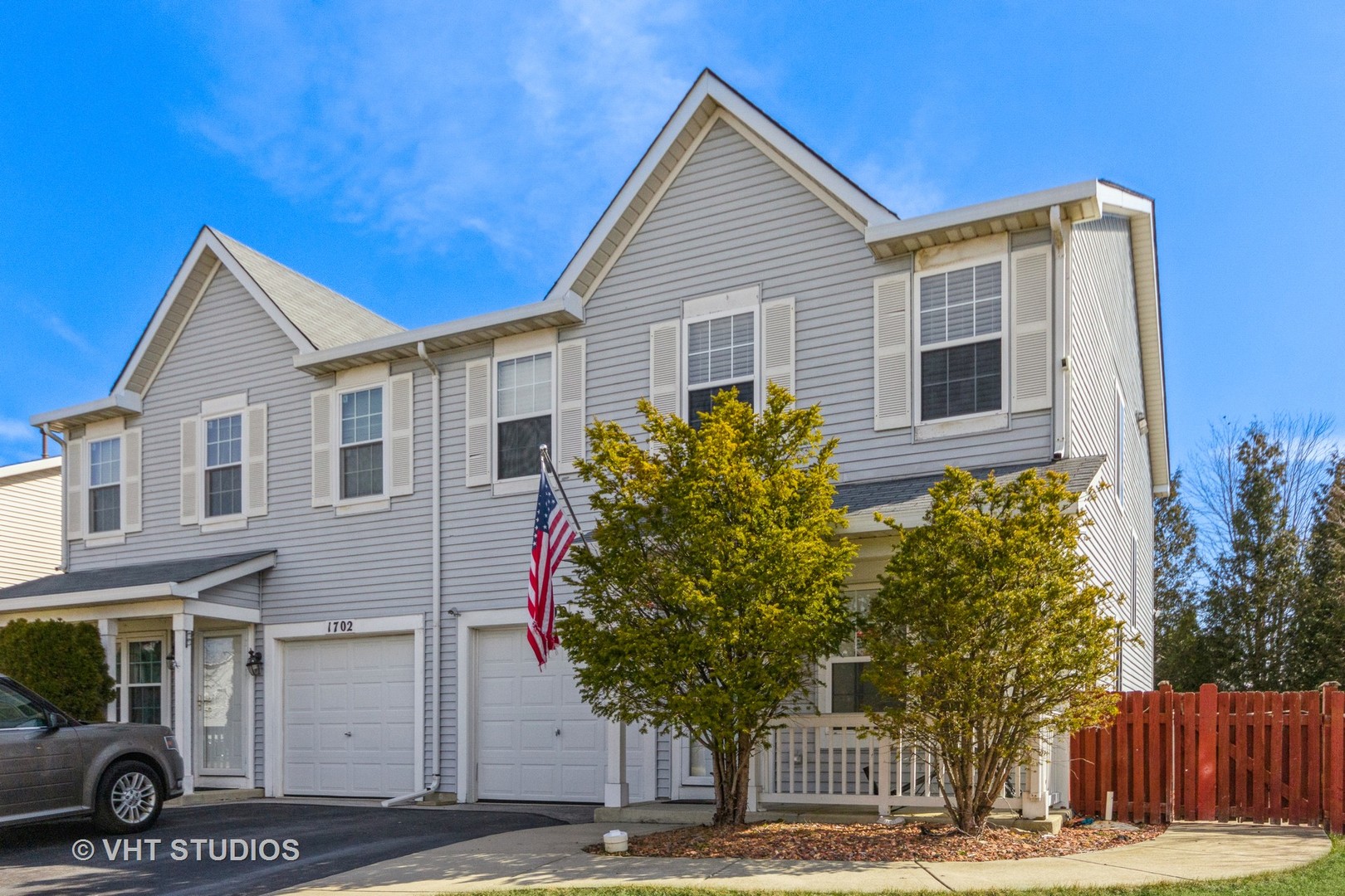 1700 Raleigh Trail Romeoville, IL 60446 - Photo 1 of 1 a view of a house with a small yard and potted plants
