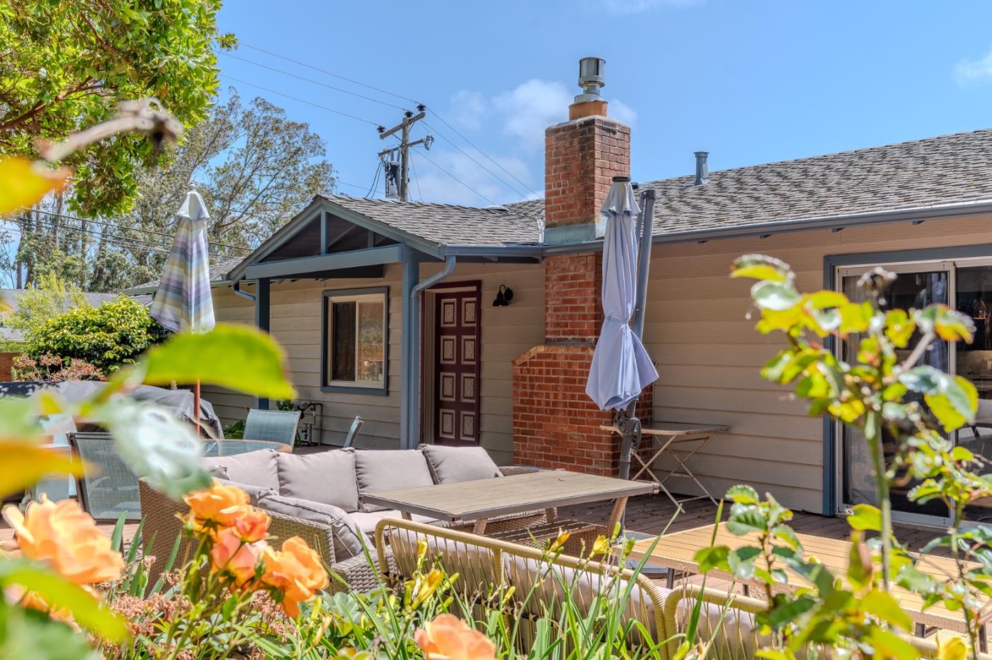 1327 Crespi Drive Pacifica, CA 94044 - Photo 24 of 48 a front view of a house with swimming pool and porch