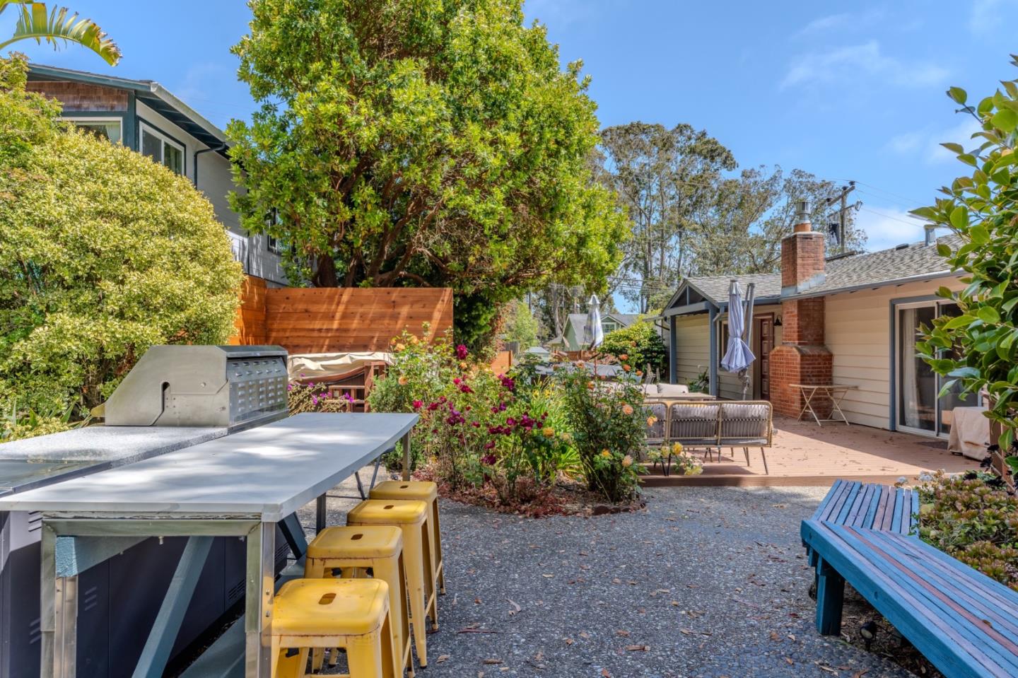 1327 Crespi Drive Pacifica, CA 94044 - Photo 31 of 48 a view of a patio with table and chairs and potted plants