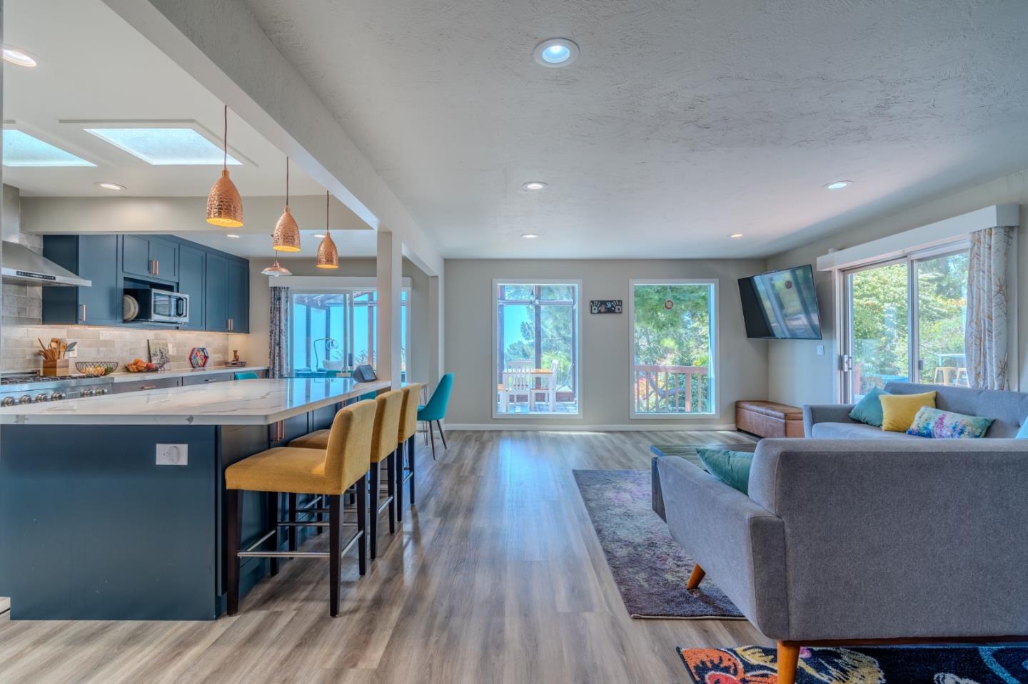 1327 Crespi Drive Pacifica, CA 94044 - Photo 7 of 48 a living room with furniture and a wooden floor
