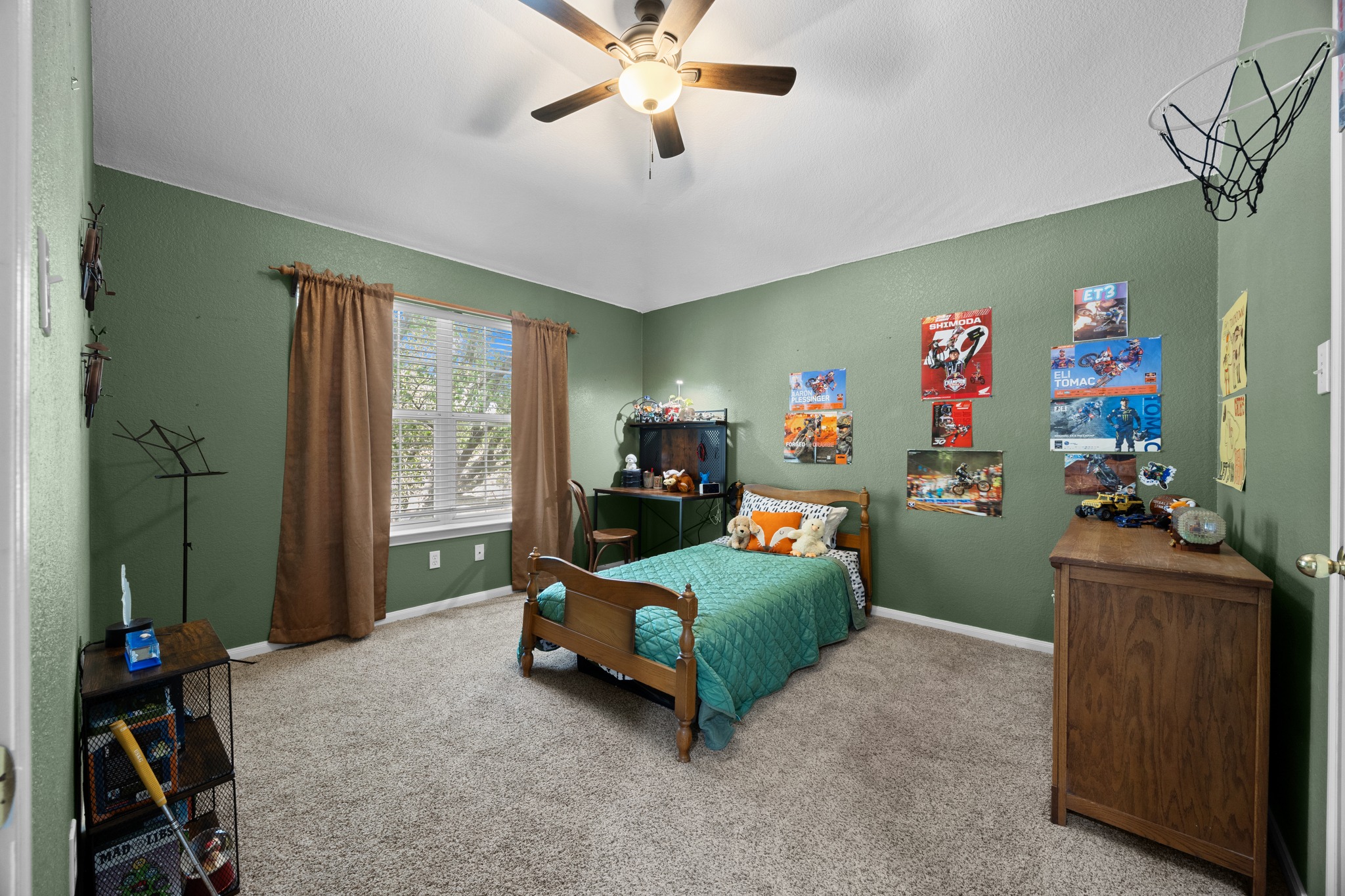 17833 Madden Drive Pflugerville, TX 78660 - Photo 16 of 21 a bedroom with a bed and a window