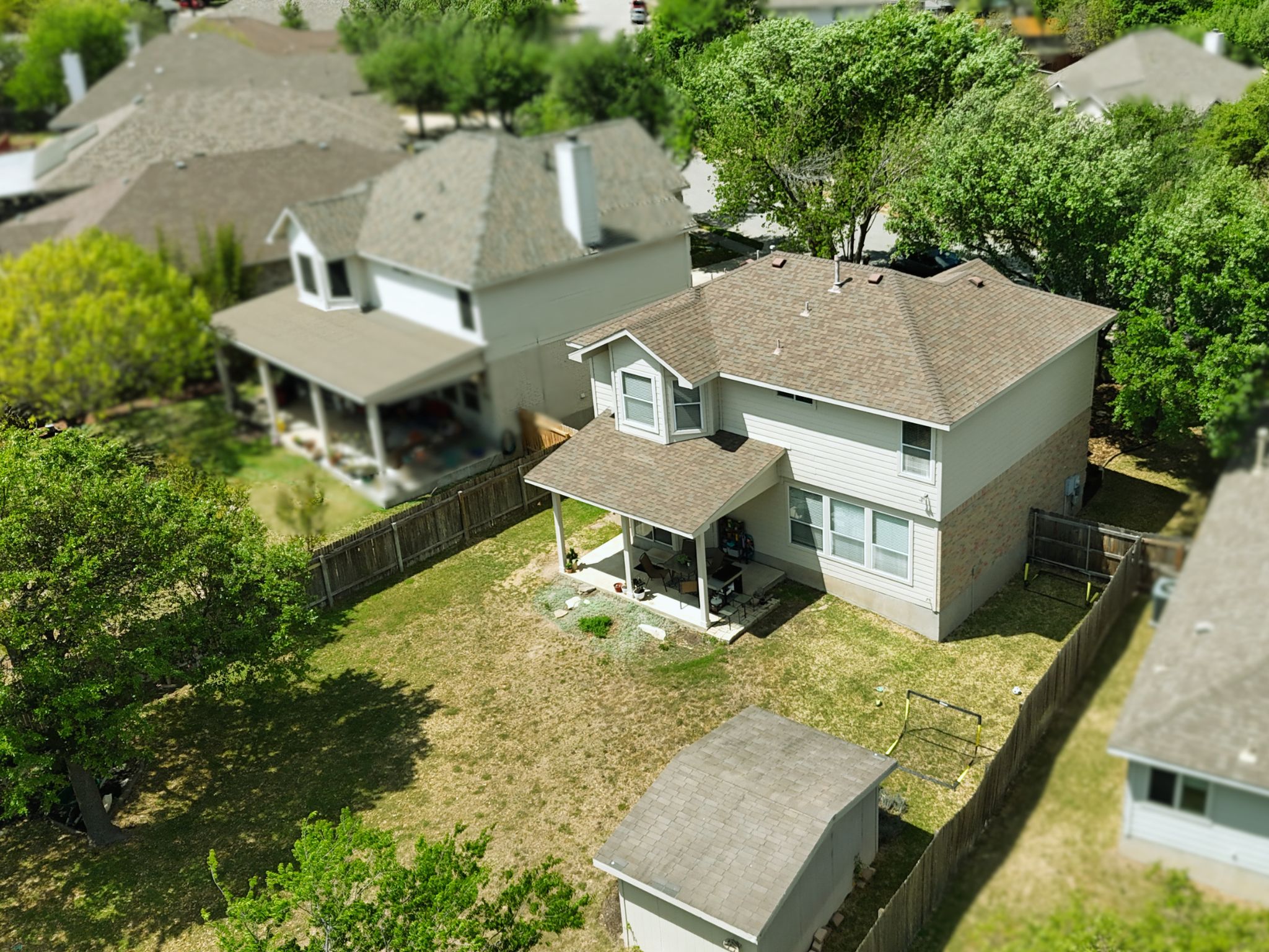 17833 Madden Drive Pflugerville, TX 78660 - Photo 19 of 21 an aerial view of a house with yard patio and furniture