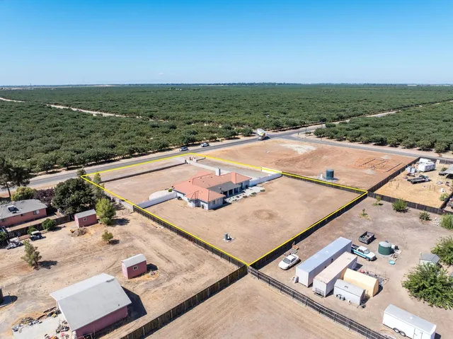an aerial view of residential house with outdoor space