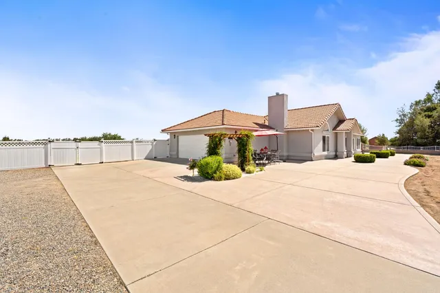 a house view with a outdoor space