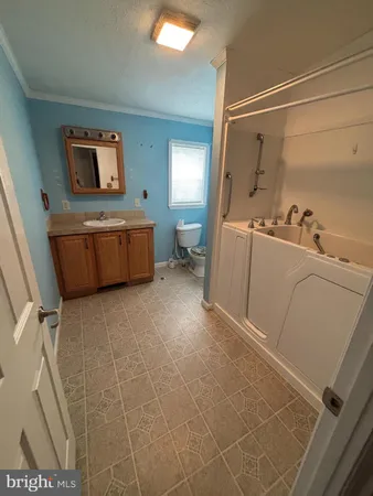 a room with a furniture and a window