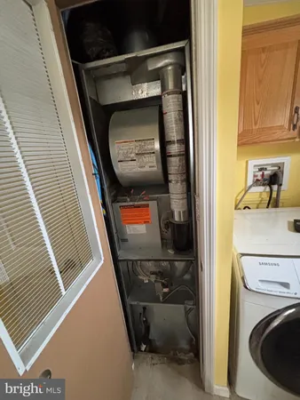 a utility room with a washer and dryer
