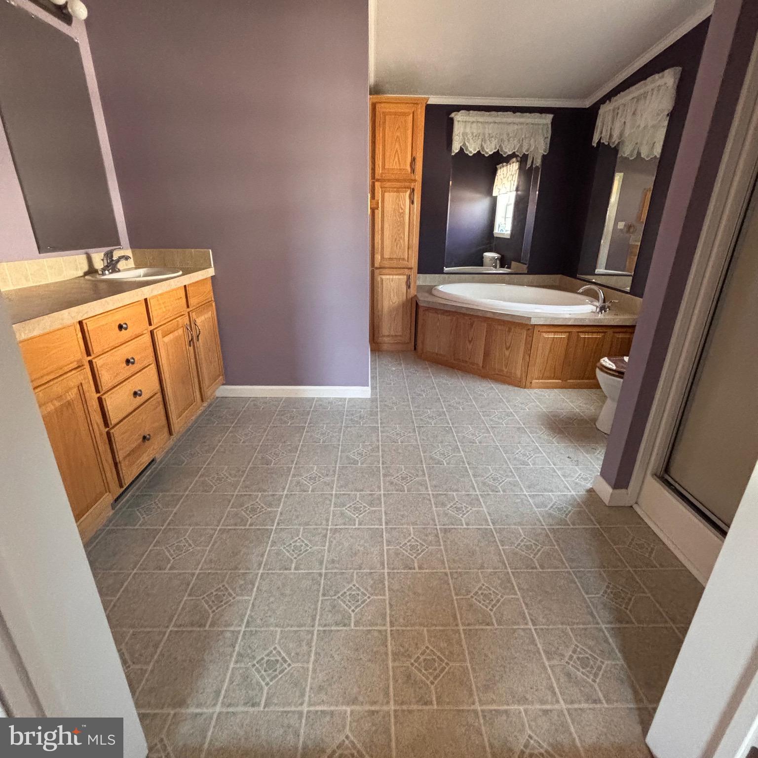 511 Sykesville Road, Unit 16 Wrightstown, NJ 08562 - Photo 10 of 10 a view of an empty room with wooden floor