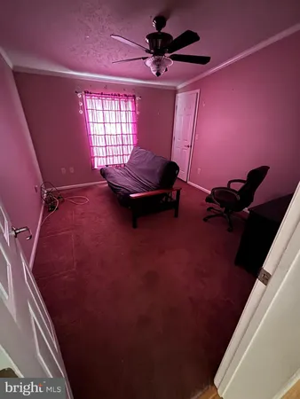 a room with furniture and window