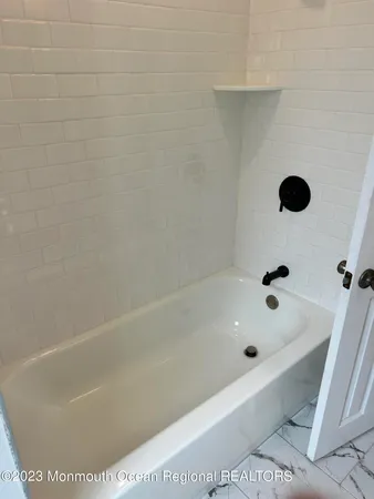 a bathroom with a bathtub