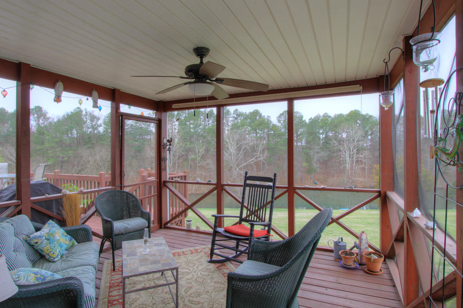 208 Longhill Road Goode, VA 24556 - Photo 19 of 59 a living room with furniture and a large window
