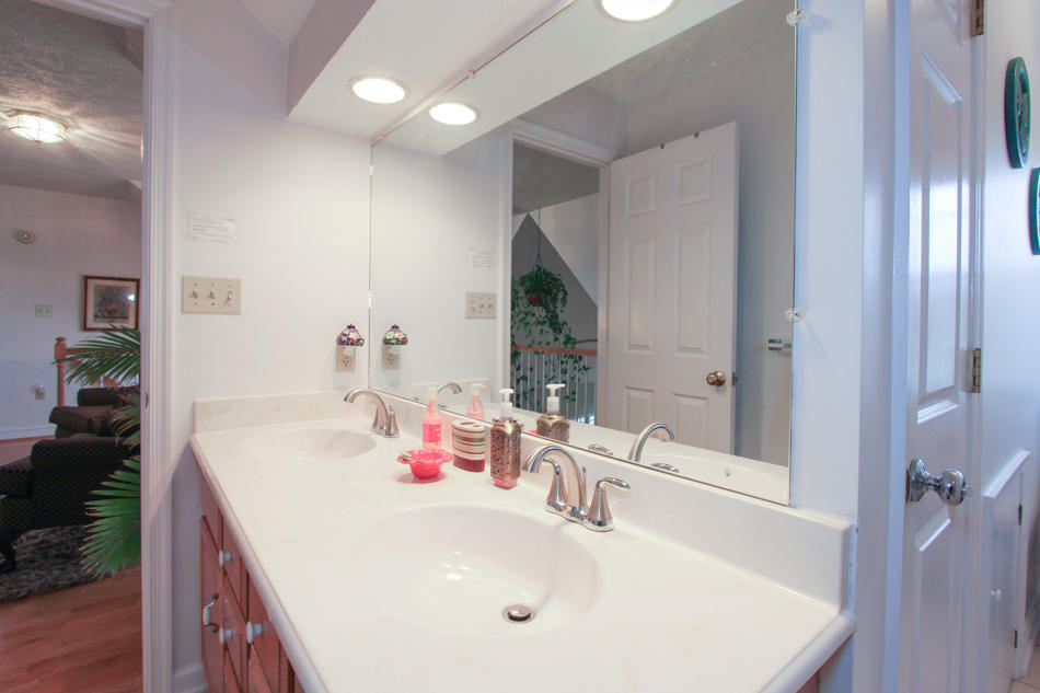 208 Longhill Road Goode, VA 24556 - Photo 44 of 59 a bathroom with a sink and a mirror