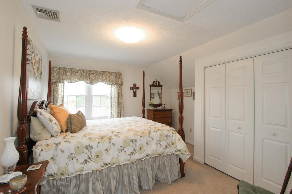 208 Longhill Road Goode, VA 24556 - Photo 45 of 59 a bedroom with a bed and a window