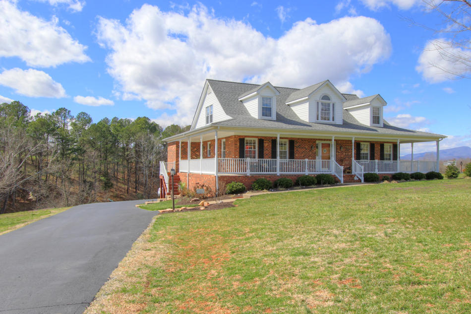 208 Longhill Road Goode, VA 24556 - Photo 58 of 59 a view of a house with a garden
