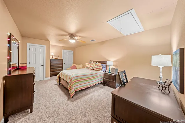 a swimming pool with outdoor seating and yard