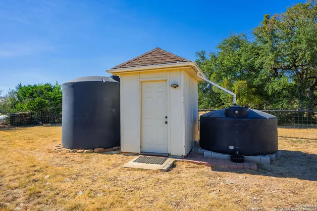 a view of lake with green space