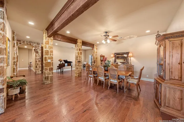 a lobby with furniture and floor to ceiling windows
