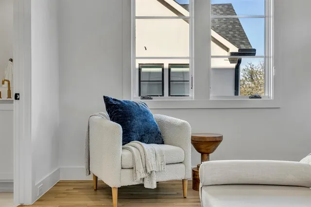 a view of balcony with furniture