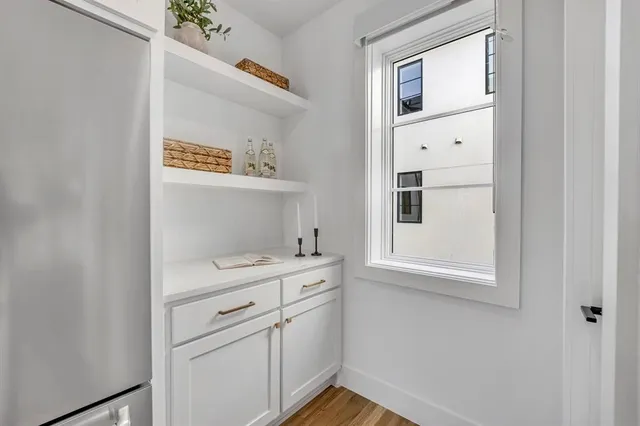 a view of bathroom with a sink dryer and washer